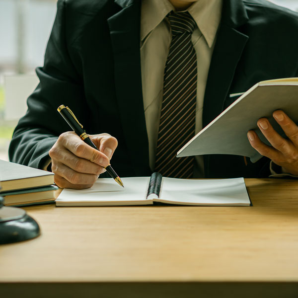 attorney explaining paperwork to client